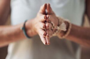 Hands of a person in holistic therapy near Denver in Colorado