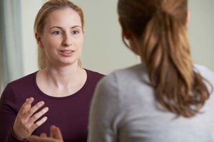 Person speaking with therapist at individual therapy near Denver in Colorado